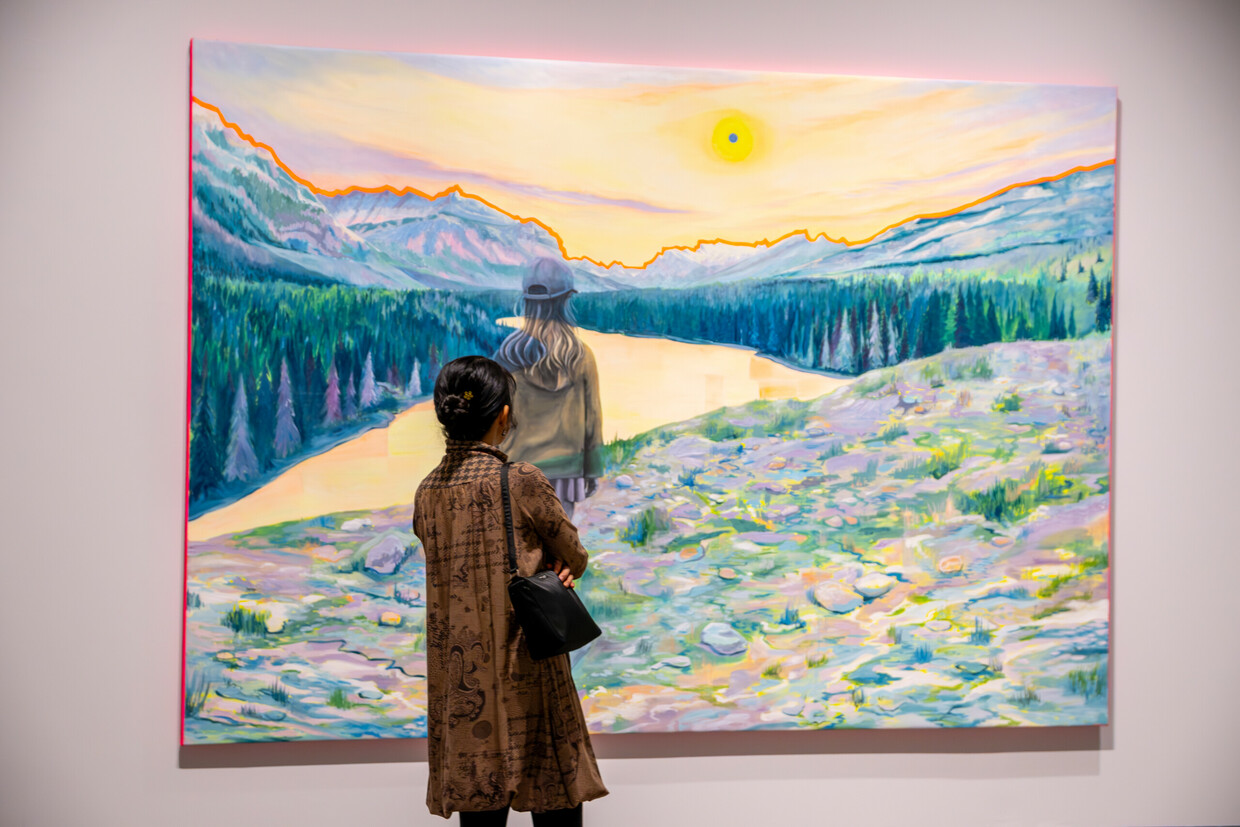 A visitor explores Erin Boake's painting 'New World Ghosts'.
