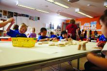 Kids at a table creating art