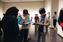 teens drawing in a gallery